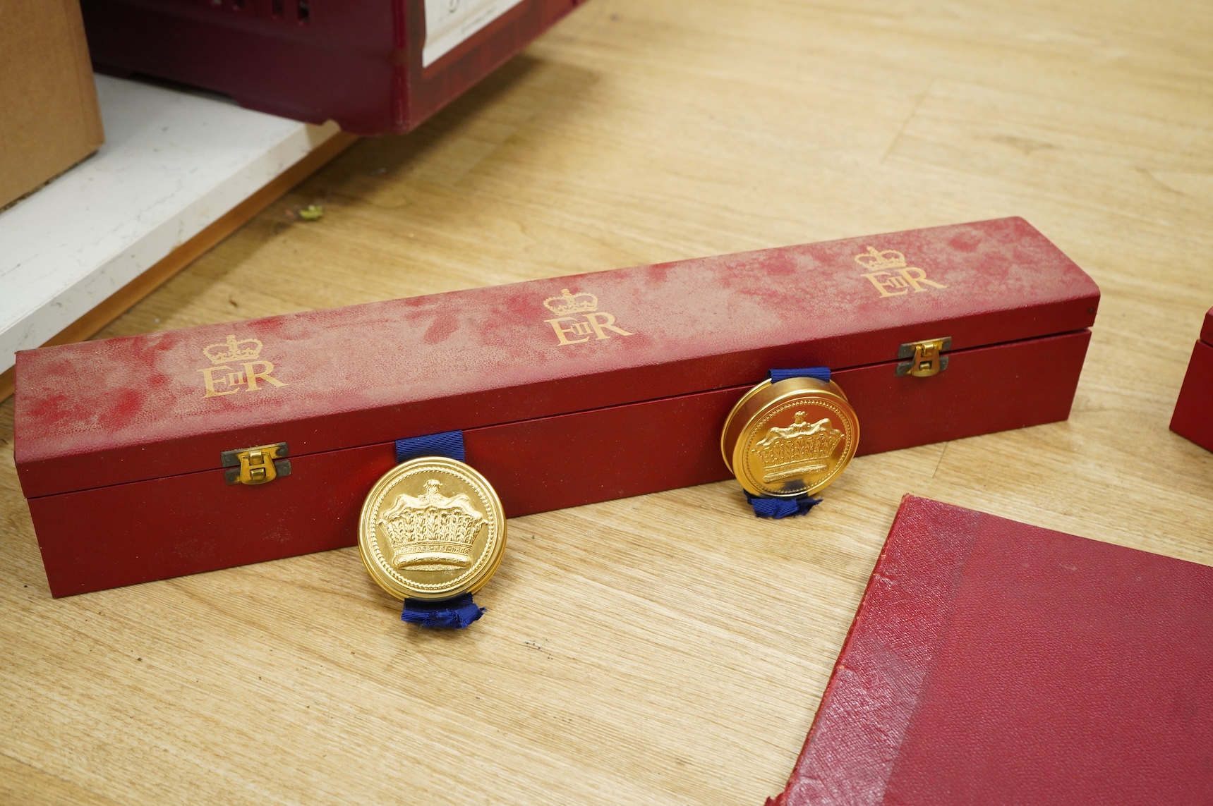 Two EIIR cased grant of arms to Peter Bickersteth and Peter Bickerstaff-Earnshaw together with a book on the pedigree of Bickersteth inscribed to Robert Alexander Bickersteth, 4 Rodney Street Liverpool